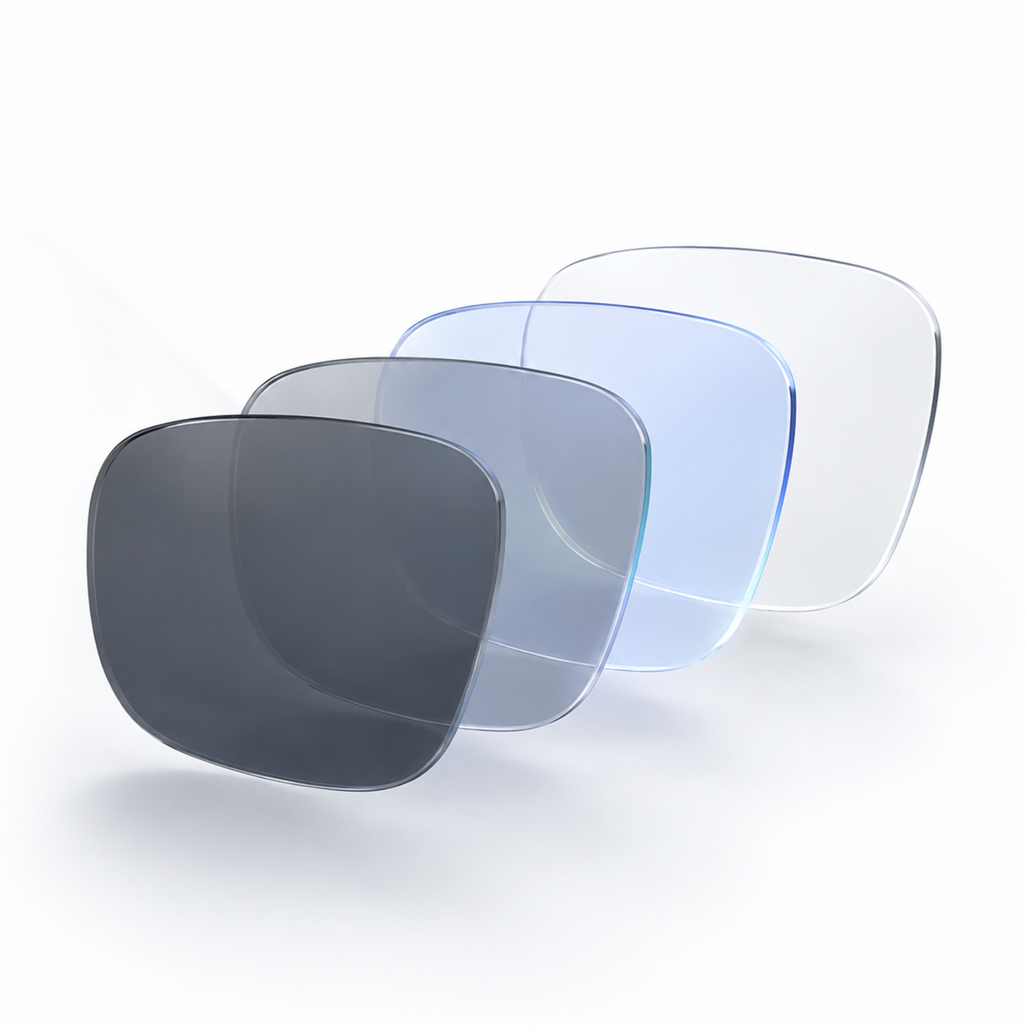 Three pairs of eyeglass lenses in different colors on a white background
