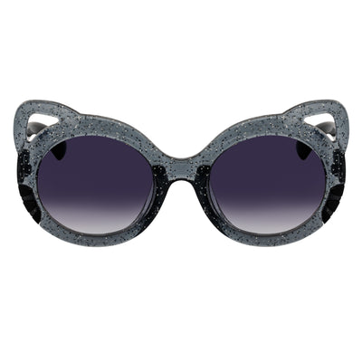 Sunglasses with cat-eye design and glittery frame on a white background